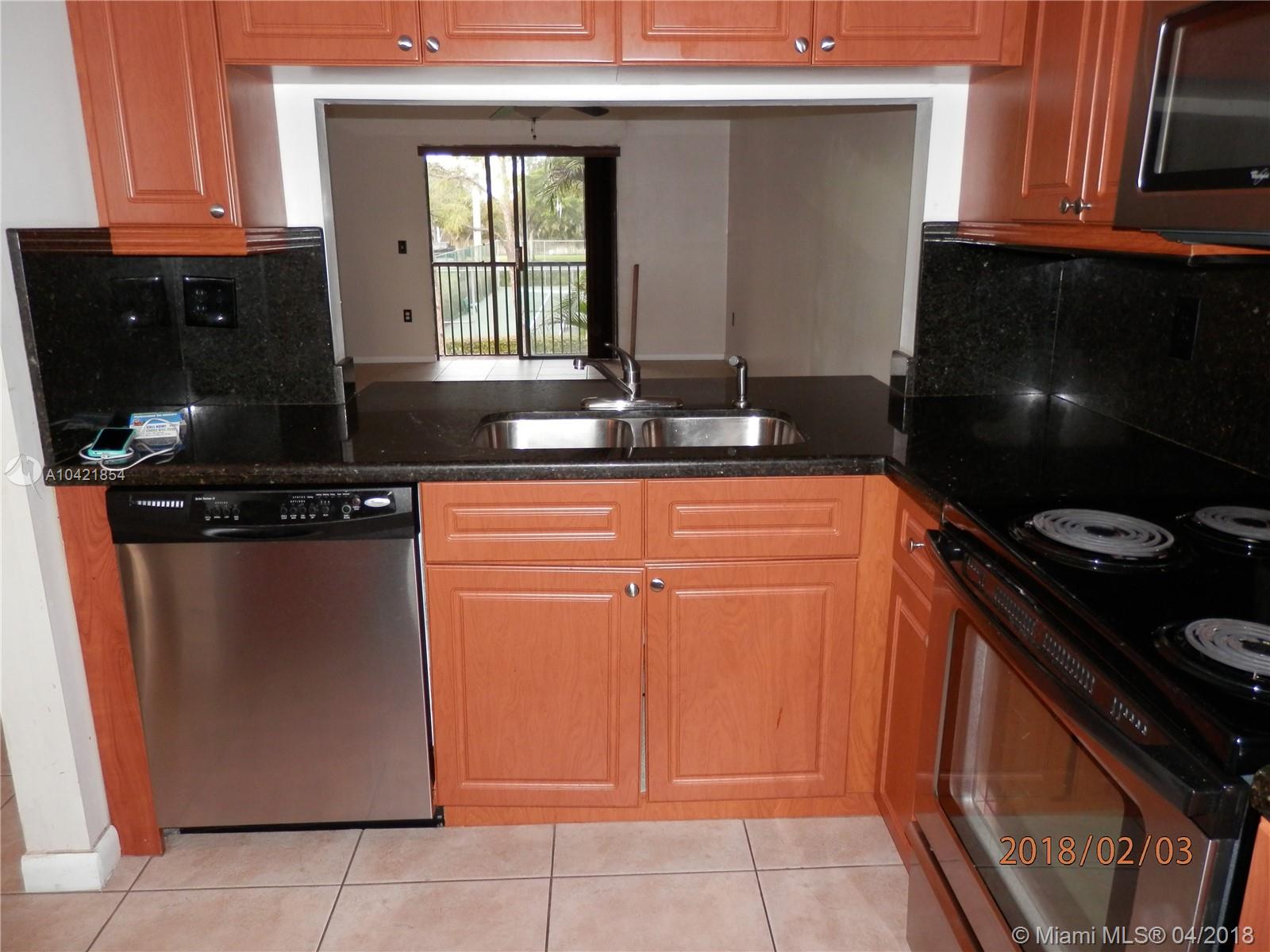 BEAUTIFUL RENOVATED UNIT 2 BEDS/2BATHS CONDO IN PEMBROKE PINES KITCHEN COMPLETE RENOVATED STAINLESS STEEL APPLIANCES, GRANITE COUNTER TOP, SPACE CABINETS. SPACIOUS LIVING ROOM IN TILE.LAMINATE FLOORS IN THE BEDROOMS. UPGRADED BATHROOMS. NICE VIEW OF TENNIS COURTS. WASHER AND DRYER INSIDE. READY FOR MOVE IN !!!!
