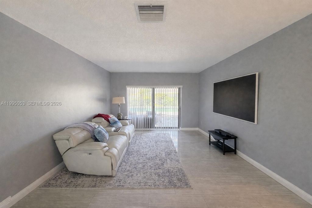 Photo of 1341 NW 71st Ave, Plantation, FL 33313 (MLS # A11995053)