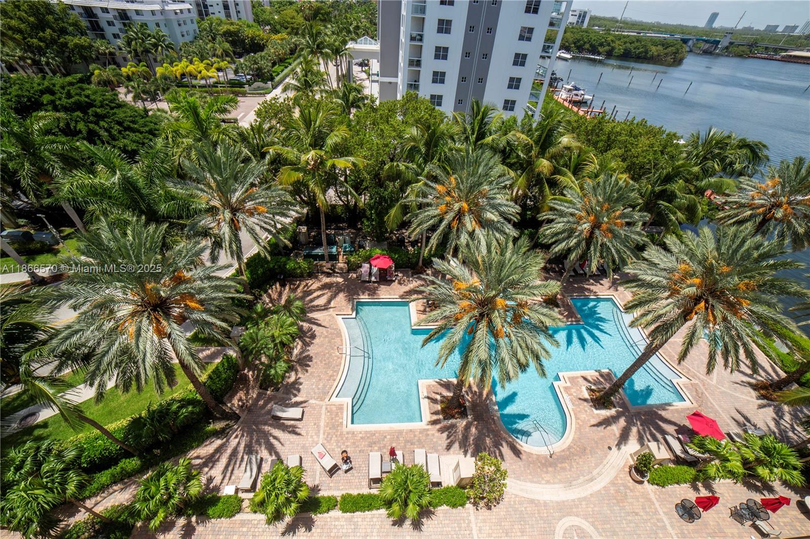 Beautifully upgraded 2-bedroom, 2-bath furnished lower penthouse in the heart of Sunny Isles Beach, featuring southern exposure, tile flooring, in-unit laundry, and an open-concept kitchen. The spacious primary suite offers a large bathroom with double sinks, a linen closet, and a walk-in closet, while the balcony provides partial bay and city views with space to dine or unwind. Enjoy resort-style amenities at Porto Bellagio, including two pools, a jacuzzi, a new gym, clubhouse, private promenade, and more. Covered, assigned parking included. Walking distance to the beach, shops, restaurants, and a top-rated K–8 school.