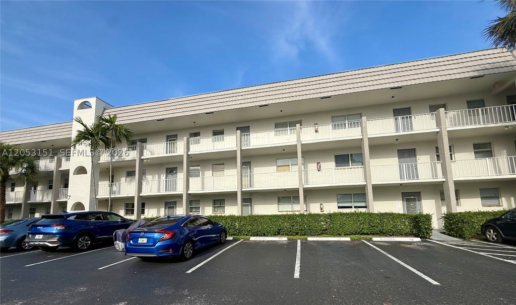 Photo of 8590 Sunrise Lakes Blvd #309, Sunrise, FL 33322 (MLS # A12053151)