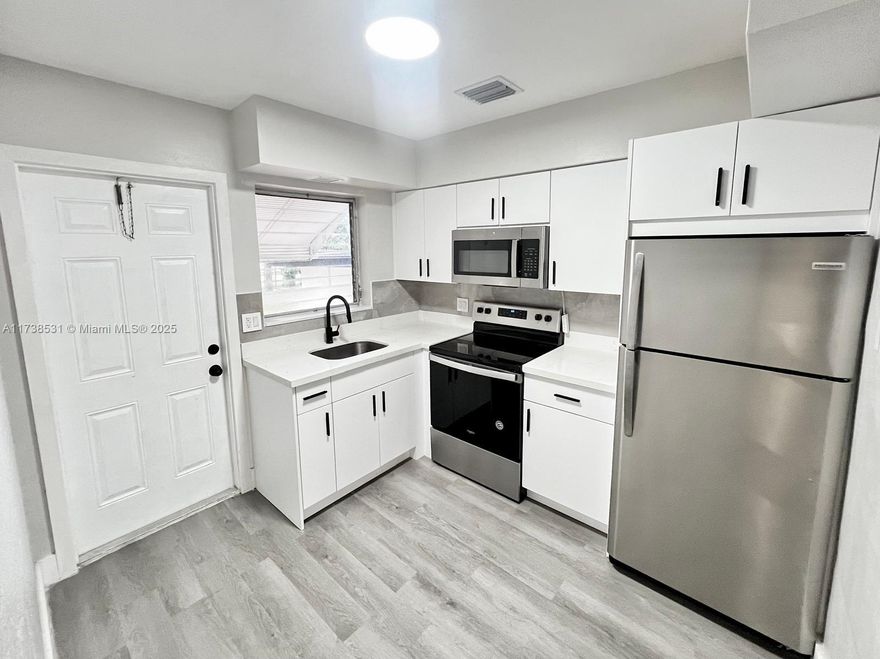 Welcome to your new home in Dania Beach! This charming home boasts 2 bedrooms, 1 bathroom, an office space, granite counters, and stainless steel appliances. With water included in the rent & 2 parking spaces, you can enjoy the convenience of a big backyard perfect for entertaining or relaxing. Located close to FLL Airport, beaches, restaurants, shopping, and more, you'll have everything you need right at your fingertips. The on-premise laundry, new central A/C, and waterproof floors make for easy living. Plus, with EASY APPROVAL, you can MOVE-IN RIGHT A AWAY and start enjoying all that this home has to offer. Don't miss out on this fantastic opportunity to live in the heart of Dania Beach!.