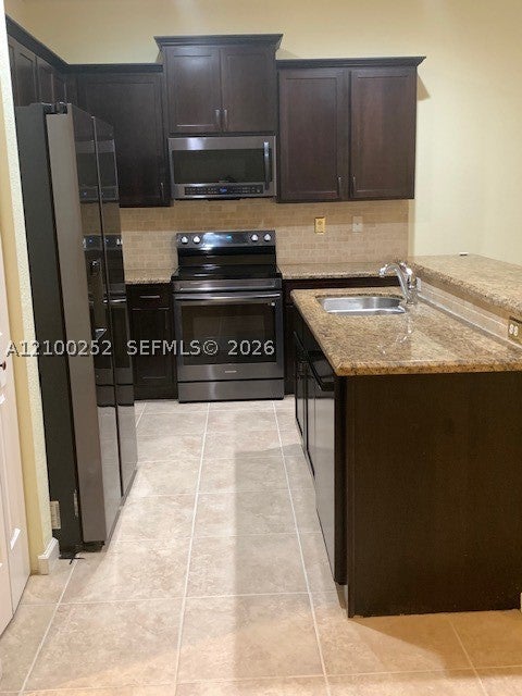 242 SW 7th Ct