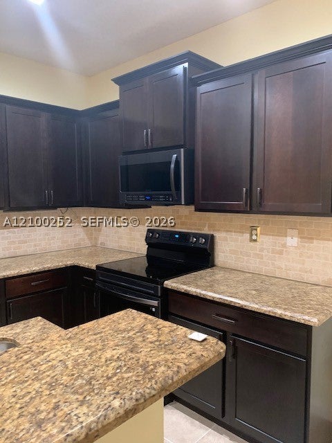 242 SW 7th Ct