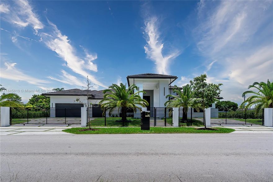 Stunning, elegant Mediterranean style home in one of Miami's finest neighborhood. Open concept, 14-16 feet soaring ceilings, modern, spacious and bright spaces waiting for the most discerning buyer.  Completed in 2023 with top of line finishes to include, Quartz Countertops, Porcelain Floors throughout, Gourmet European Style Kitchen, Thermador Appliances, Marble Bathrooms.  Oversized Master Suite with separate sitting/lounging area, dual closets.  Security camera system, smart home features, sprinkler system, floor to ceiling fireplace, space for wine room.  Expansive covered terrace, modern oversized pool with spa and swim out to enjoy the Florida lifestyle.  Room for a Summer Kitchen, RV and/or boat.