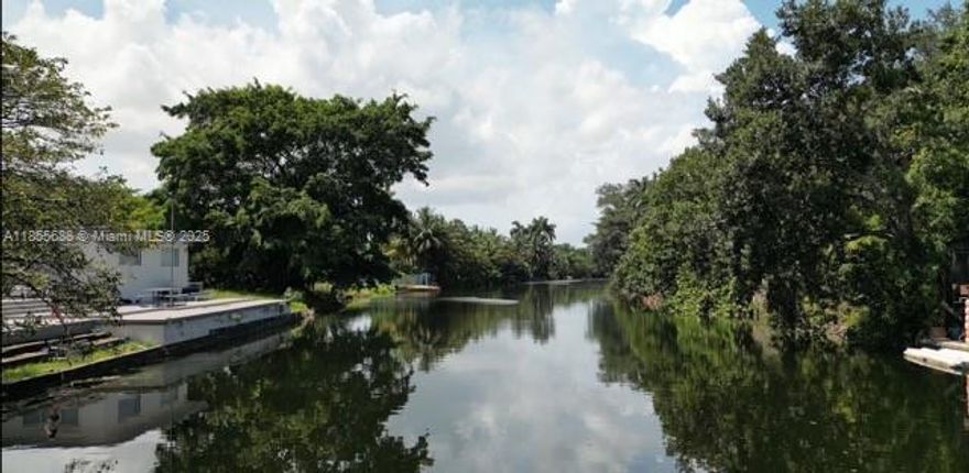 Discover a rare opportunity to own a stunning waterfront property offering unmatched privacy, thanks to unobstructed views and no neighboring structures directly adjacent. Located in the desirable city of North Miami, this lot allows for the construction of a custom home of 3,500+ square feet, giving you the freedom to design your ideal living space.

Enjoy a lifestyle surrounded by natural beauty and convenience, just minutes from the serene  Spanish Monastery, Oleta River State Park, and world-class shopping and dining at Aventura Mall’s 300+ stores and upscale restaurants.

Whether you envision a modern masterpiece or a timeless retreat, this property is your blank canvas on the water.