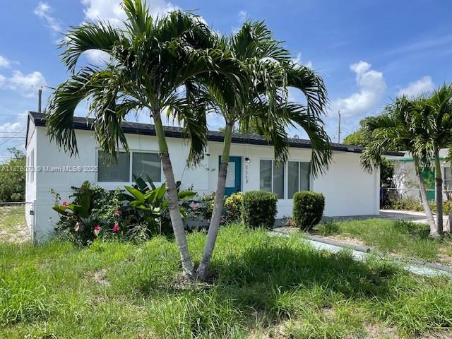This beautiful house offers 3 bedrooms, 2 bathrooms ensuring peace of mind for years to come. Freshly Painted , New Roof , Impact Windows , Stainless Steel Appliances , Washer and Dryer Nestled in an amazing location close to West Palm Beach downtown, Palm Beach Island and the picturesque Peanut Island, you'll enjoy convenient access to entertainment, dining, and outdoor activities. Step inside to discover a spacious interior, perfect for comfortable living and entertaining guests. This house offers a modern and fresh look throughout. Every detail has been carefully considered to create a welcoming and functional living space. AS IS.