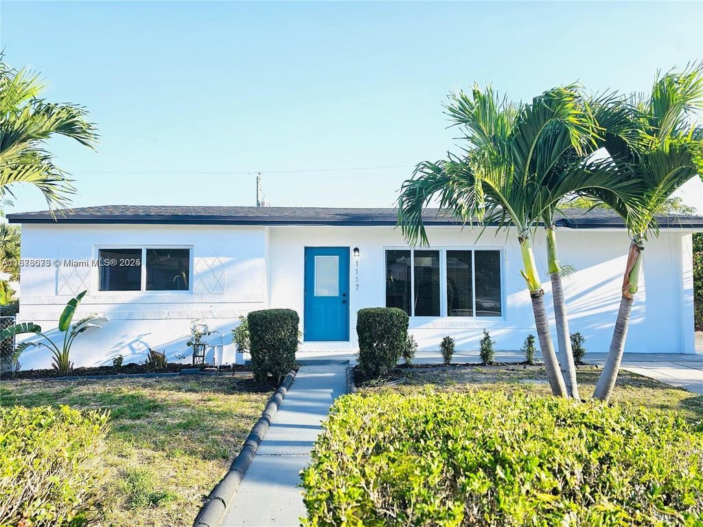 Photo of 1117 W 26th Ct, Riviera Beach, FL 33404 (MLS # A11876073)