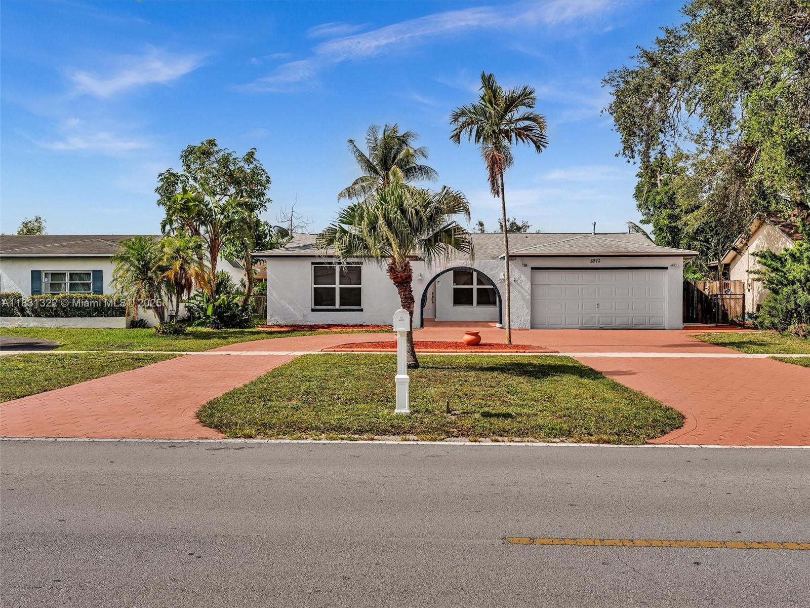 WELCOME TO YOUR NEW HOME! GORGEOUS 3-BED, 2-BATH POOL HOME LOCATED IN PRIME PEMBROKE PINES! THIS MOVE-IN READY GEM FEATURES A SPACIOUS SPLIT FLOOR PLAN, FORMAL DINING ROOM, DEN/OFFICE, TILE & LAMINATE FLOORS, AND A SCREENED-IN POOL PERFECT FOR ENTERTAINING. ENJOY A 2-CAR GARAGE WITH BUILT-IN STORAGE SHELVES, RECENT ROOF (2021), NEW POOL PUMP, NEW WATER HEATER, BRAND NEW WASHER, STAINLESS STEEL APPLIANCES, SPOTLIGHTS THROUGHOUT, AND A DEDICATED LAUNDRY ROOM. FRESHLY PAINTED EXTERIOR, BEAUTIFUL NEW PAVERS, AND A STUNNING CIRCULAR DRIVEWAY; THE MOST IMPRESSIVE IN THE NEIGHBORHOOD AND WITH ROOM FOR MULTIPLE CARS. LOCATED MINUTES FROM PEMBROKE LAKES MALL, CB SMITH PARK, TOP RESTAURANTS, HARD ROCK, AIRPORTS & BEACHES. PERFECT FOR FAMILIES LOOKING TO ENJOY THE BEST OF SOUTH FLORIDA LIVING!