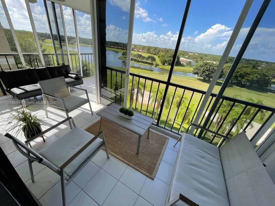Stunning Corner Unit with Panoramic Golf Course Views. Experience resort living in this exceptional 2-bedroom, 2.5-bath corner residence overlooking the scenic Bonaventure Golf Course. Enjoy your own private sanctuary with an expansive enclosed balcony offering breathtaking, unobstructed views. Both spacious bedrooms are master-sized and feature en-suite bathrooms for ultimate comfort and privacy. Impact-resistant windows fill the home with natural light while providing peace and security. Resort-style amenities include 24/7 concierge service, a stylish lobby, resident social room, professional on-site management, and a serene pool oasis. Don’t miss this rare opportunity to live in one of Weston's most sought-after communities.
