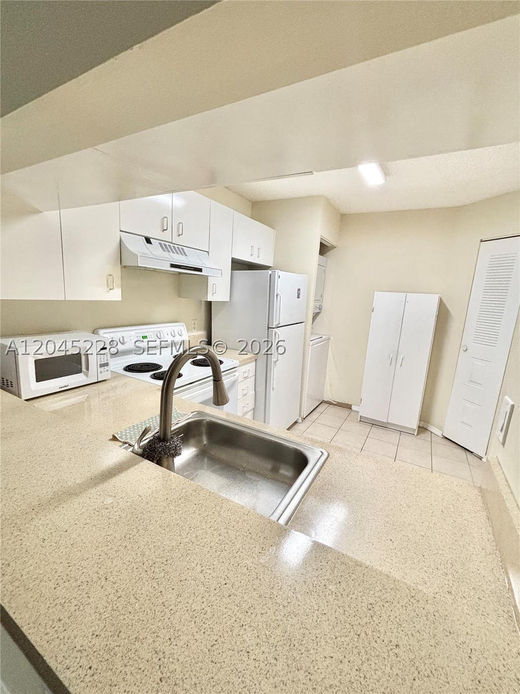 Photo of 1040 Coral Club Dr #1040, Coral Springs, FL 33071 (MLS # A12045228)