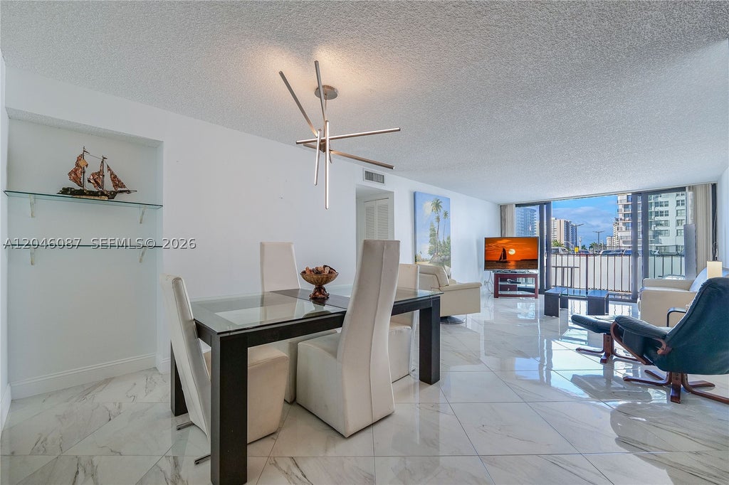 Photo of 2401 S Ocean Dr #305, Hollywood, FL 33019 (MLS # A12046087)