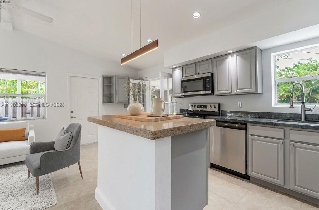 Photo of 1032 SW 22nd Ter, Fort Lauderdale, FL 33312 (MLS # A11952816)