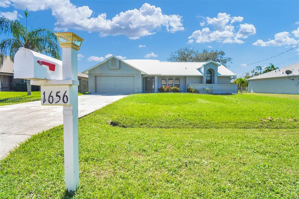 Photo of 1656 SE North Blackwell Dr, Port Saint Lucie, FL 34952 (MLS # A11489397)