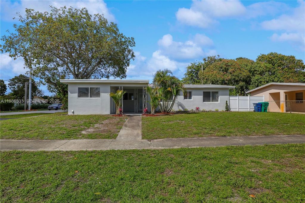 Photo of 4841 NW 12th Ct, Lauderhill, FL 33313 (MLS # A11986533)