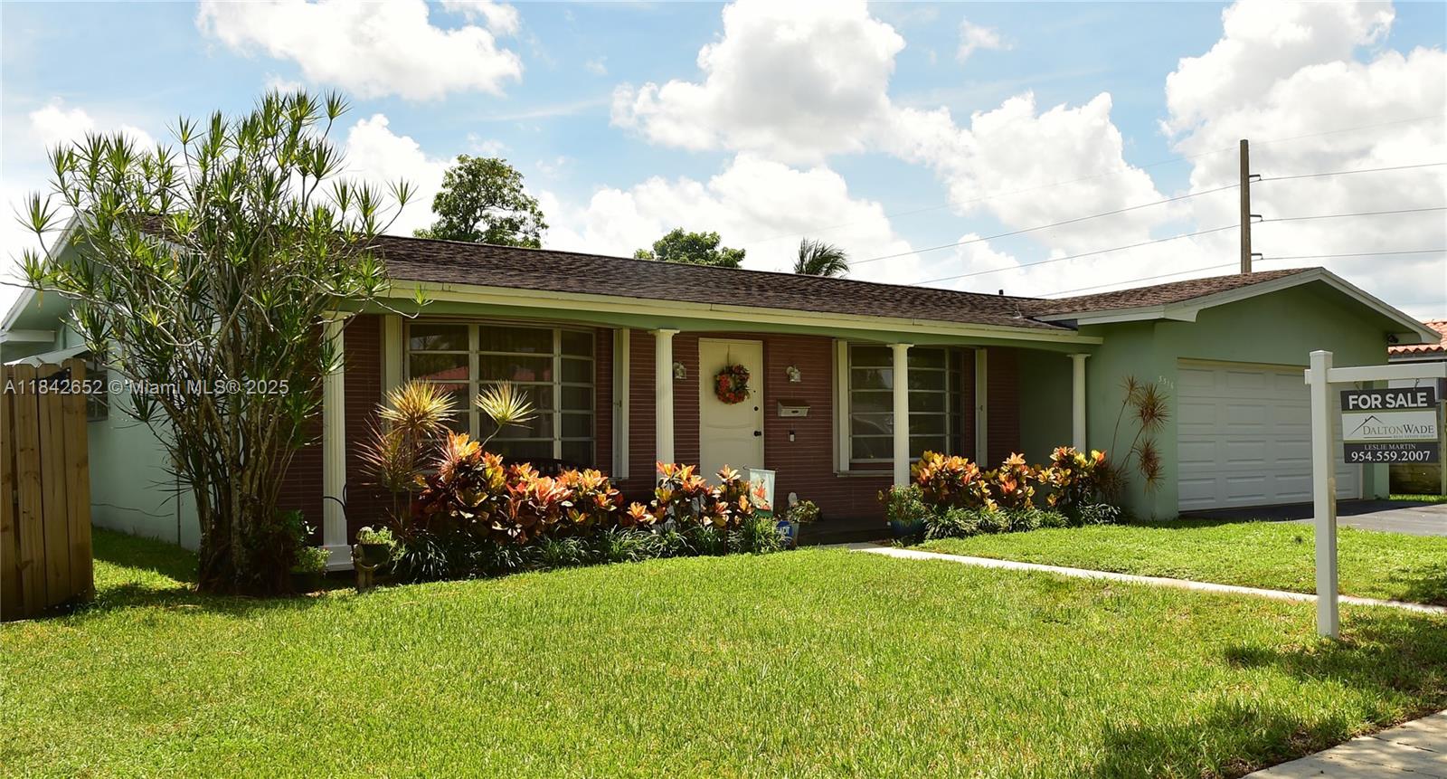 Price Improvement! This 3BR/2.5BA home represents retro living in the heart of Americana- Hollywood Hills that is! This house features a screened-in back patio, den (usable as a dining room) and a 2 car garage protected by an insulated reinforced garage door. A buyer's opportunity to appreciate the past or build for the future. The ideal location; it is close to everything and centrally located for quick access to the Turnpike and I95. From here it is a 15 minute drive to FLL airport.
