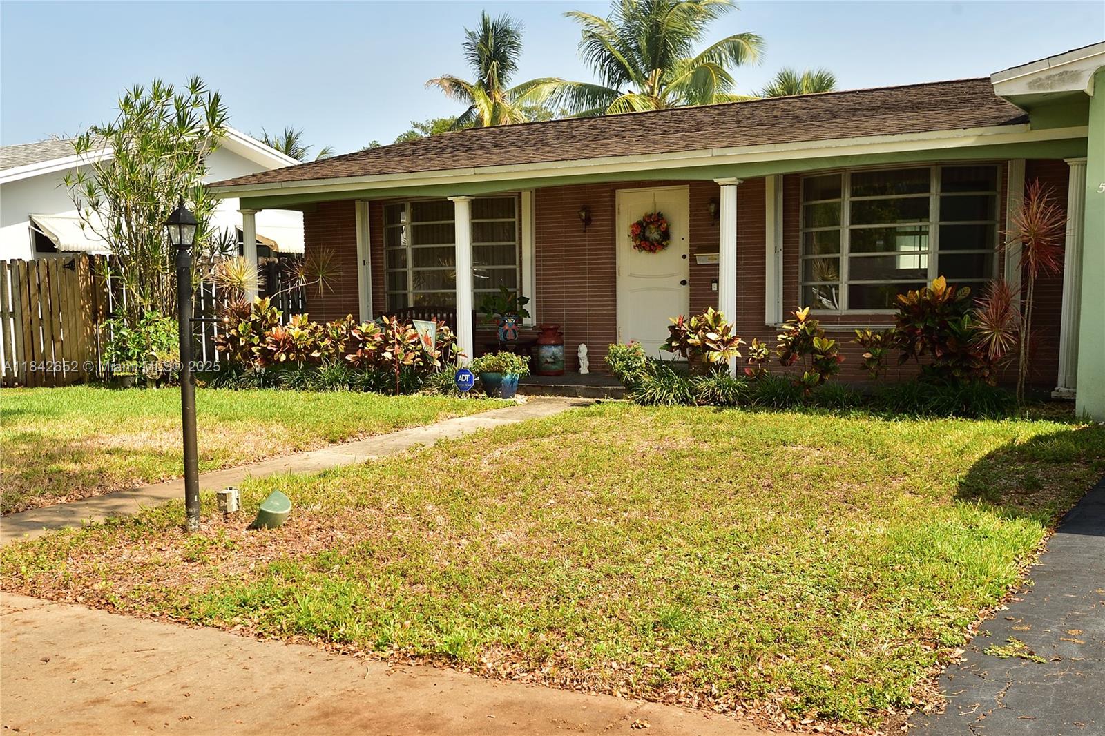 This 3BR/2.5BA home represents retro living in the heart of Americana- Hollywood Hills that is! This house features a screened-in back patio, den (usable as a dining room) and a 2 car garage protected by an insulated reinforced garage door. A buyer's opportunity to appreciate the past or build for the future. The ideal location; it is close to everything and centrally located for quick access to the Turnpike and I95. From here it is a 15 minute drive to FLL airport.