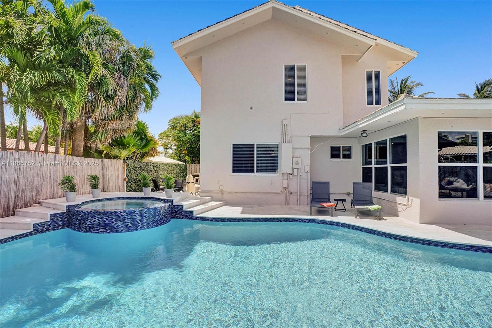 Stunning home with modern kitchen and modern bathrooms and beautiful deck and pool on the amazing hillsboro shores neighborhood just steps from the beach with private beach access limited to the hoa of the hillsboro shores neighborhood - one of the best values in the neighborhood 2 stories beautiful marble floors and glass railings this home is ready to move in all you need is your toothbrush