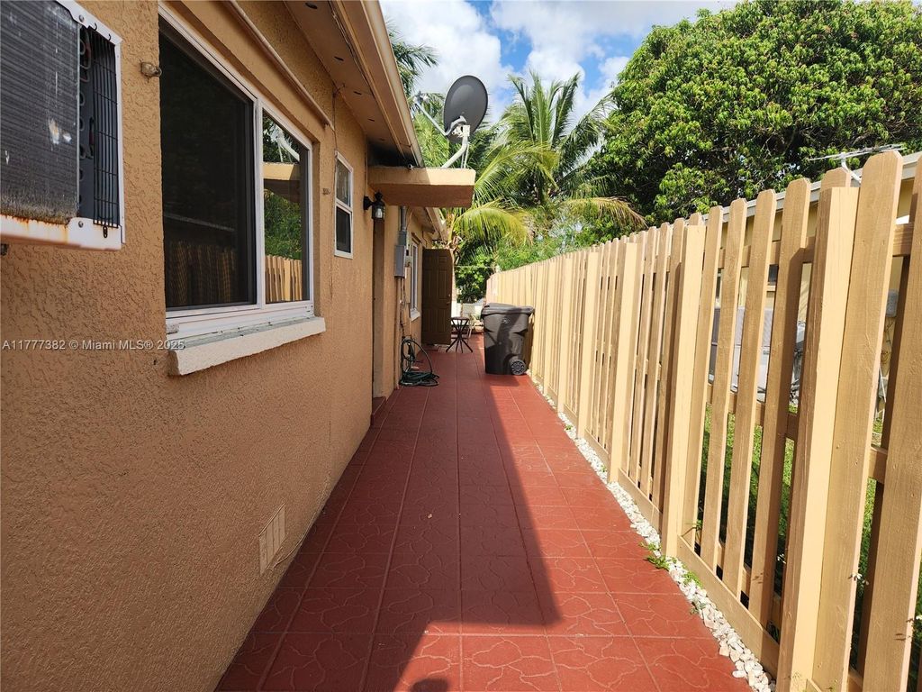 Photo of 4001 NW 46th Way #1, Lauderdale Lakes, FL 33319 (MLS # A11777382)