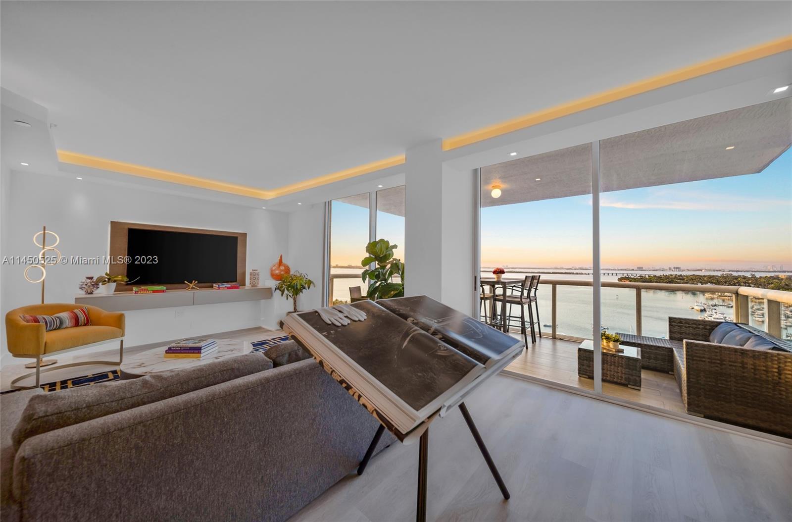 Welcome to your ultimate luxury oasis in Miami Beach. This turnkey and fully furnished condo exudes elegance and sophistication while offering an unparalleled living experience. The condo features 2 bedrooms and 2 bathrooms with white oak floors throughout, cove lighting and custom doors. The kitchen is equipped with KitchenAid appliances and quartz countertops for a seamless culinary experience. The balconies feature floor to ceiling glass sliders to enjoy the views of Miami, South Beach and Biscayne Bay. The condo's prime location offers easy access to the vibrant Miami scene, while still providing a serene and exclusive retreat. Five-star amenities include a resort style pool with cabanas, tennis court, fitness center, 24-hour concierge service, valet and on-site management.