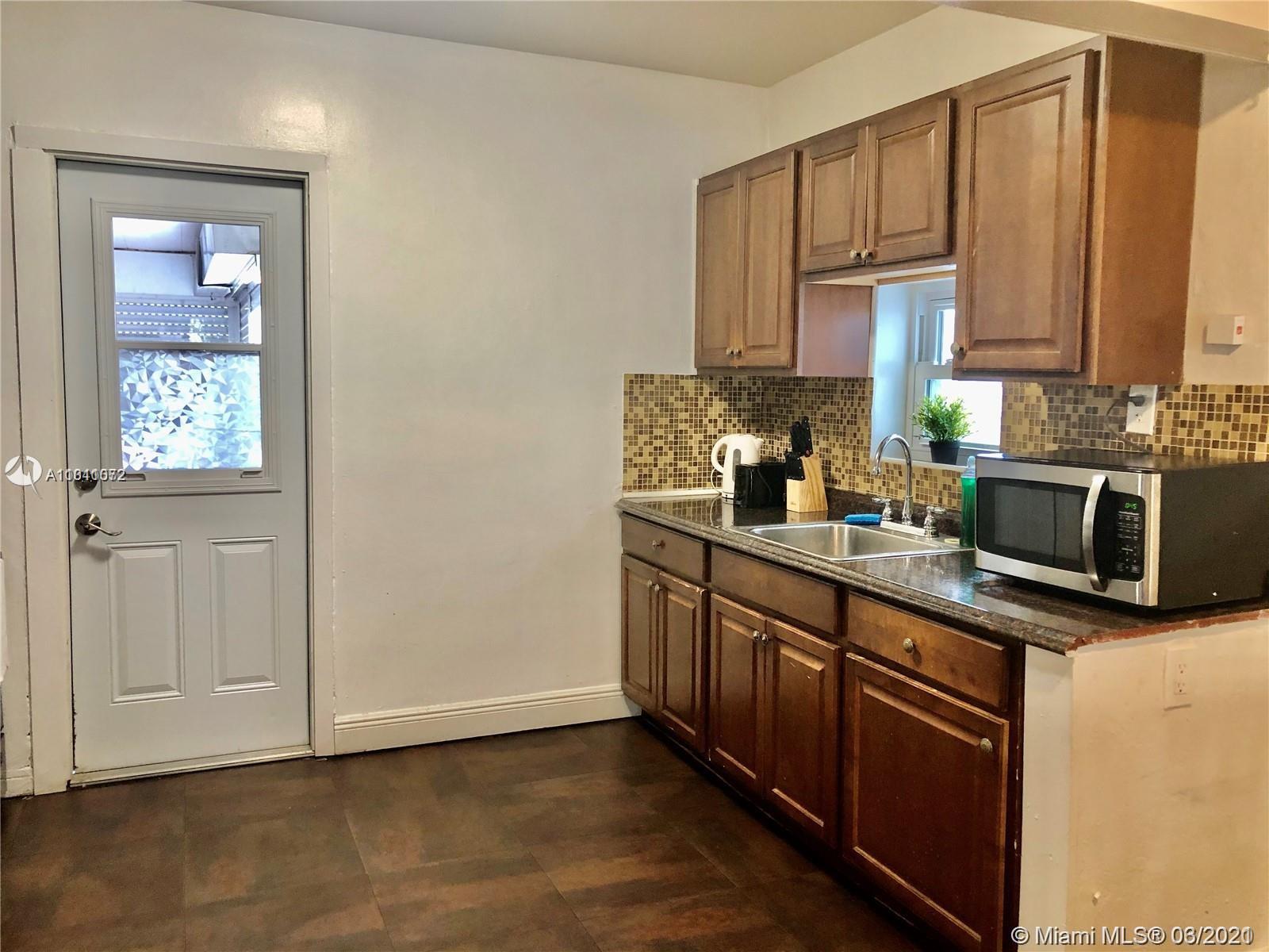 GREAT OPPORTUNITY; LEGAL TRIPLEX, IMPACT WINDOWS, (1) ELECTRIC PANEL, ** AGENTS PLEASE READ all remarks, incl SUPPLEMENTAL REMARKS for expenses info. Unit#1 Spacious 2/1 rented until July, $1595 mo. Living/Dining, Wood floors, screened in back patio. UNIT B: is rented $950 mo. to mo. 1/1 Kitchen & full bath, tile flooring, currently mo-mo. tenant. UNIT C: 1/1 w/Kitchen, large full Bath, Dining Area, ceramic tiled flooring, currently vacant WAS used as a AIRBNB. mo. rent $950 mo. Addt'l parking in rear of property for 4 vehicles , access from alley in rear of property. Huge fenced in backyard, room for a pool/pets Conveniently LOCATED close to Ft. Laud airport and other major highways, Casinos and just 5 minutes to the beach, lots of shopping & dining close by. Some furnishings incl.