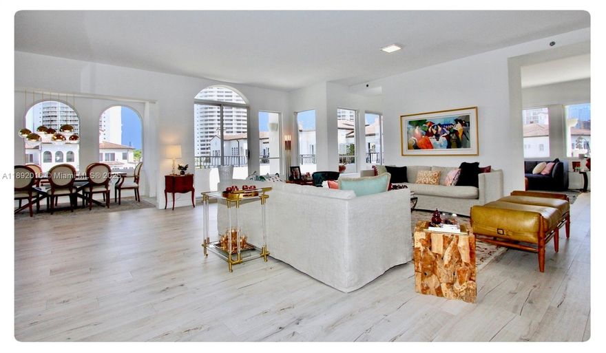 A Unique Penthouse in the sky. Elevator opens directly into your new renovated home w/ Rectified Spanish Porcelain flooring and designer paneling. 12’ High Ceilings,Open Airy feeling, tremendous social space w/open kitchen built by Mia Cucina, Waterfall quartz countertops.Wolf Induction range, micro &hood,Subzero 48 fridge, Asko Dishwasher, Oversized laundry,Eat in kitchen,Walk-in 146 SubZero bottle wine cellar, remote window treatments,Italian custom Mia Cucina closet & bathrooms systems,Toto Washlet toilets,LED lighting,Sonos surround sound, Insteon automated light touch &A/C system accessible by smartphone, tablet/pc.Wallpaper & many decorative touches.Live well w/ full amenities:16 Tennis Courts, 3 restaurants, 27,000 SF Health Spa,Kids Playground,Doggie park,Marina,Courtesy Bus & more