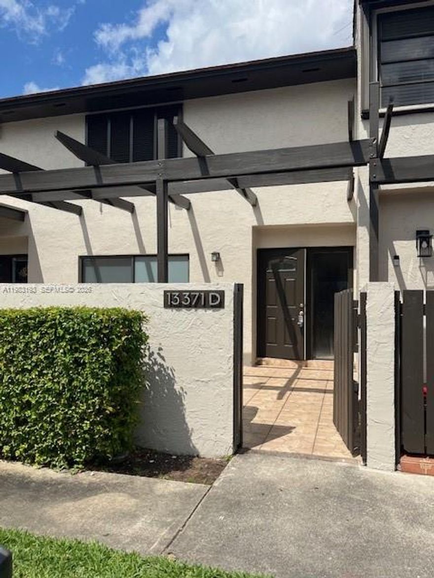 Beautiful, spacious and well maintained townhouse in the well desired and gated community of Calusa Point in Kendall.  Property features 3 bedrooms, 2 1/2 baths, tile and laminate floors throughout.  Washer and Dryer in the unit.  A lovely patio to enjoy with family and friends.  Community offers pool, tennis and racquetball courts and much more.  Conveniently located near shopping, dining and major highways. A must see!!!