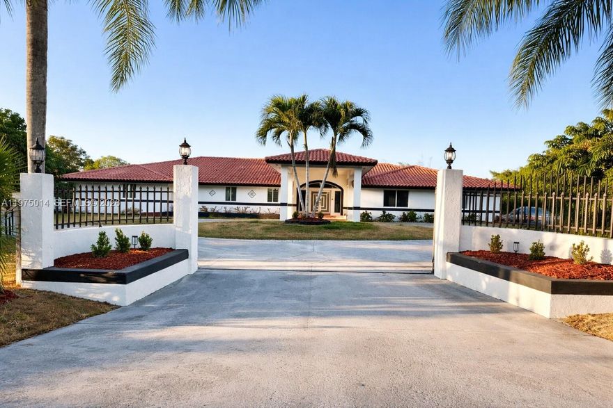 SPACIOUS 1.25 ACRE PROPERTY IN LOS REDLANDS. This beautiful residence offers the ideal balance to togetherness and privacy, with multiple living space perfect for large  families. The main home features 4 Bedrooms and 3 Bathrooms, a Brand-new kitchen with a large island ideal for gatherings, formal dining room, fireplace, screened terrace, Brand new A/C unit and abundant natural light throughout. Impact Windows and Doors provide security and peace of mind.

In additional to the main residence the property includes a 2022-built apartment with its own private entrance, Kitchen, living area, bedroom & bathroom-perfect for in-laws or extended family.
A separate 2018 Guest House (approx. 1,280 sq ft) offers 2 bedrooms 2 bathrooms, kitchen, living room and patio, creating additional independence while keeping everyone close.

The expansive grounds provide ample outdoor space for entertaining, family activities and future possibilities. Fruit trees including avocado, plantain, mango and guava enhance the property's functionality and charm. 
A fully separate 2018 guest house.