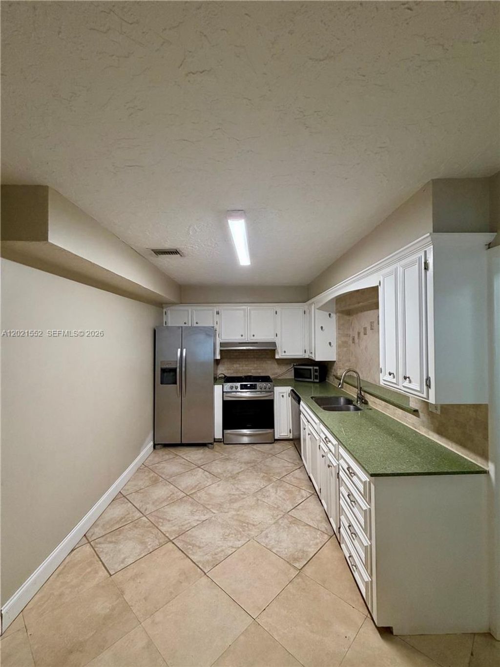 Photo of 211 Dartmouth Dr, Lake Worth, FL 33460 (MLS # A12021552)
