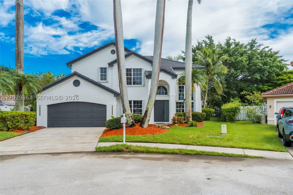Photo of 743 NW 174th Ter, Pembroke Pines, FL 33029 (MLS # A12079364)
