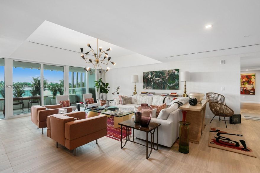 Welcome to The Ritz-Carlton Residences, Miami Beach, designed by renowned architect Piero Lissoni. This 3,310 SF residence, plus a 474 SF balcony, offers floor-to-ceiling windows, filling the space with natural light. The open layout features 3 bedrooms + a den/media room, 3.5 bathrooms, a laundry room, and abundant storage. The primary suite includes walk-in closets and a spa-like double bathroom, while the kitchen boasts Gaggenau appliances and a gas stove. Enjoy world-class amenities such as a rooftop pool, fitness center, concierge, valet, spa, residents' restaurant, a four-sport simulator, art studio, & private boat docks on Surprise Lake with direct Intracoastal access. Located minutes from South Beach and Downtown, it's a perfect choice for those seeking both luxury and convenience.