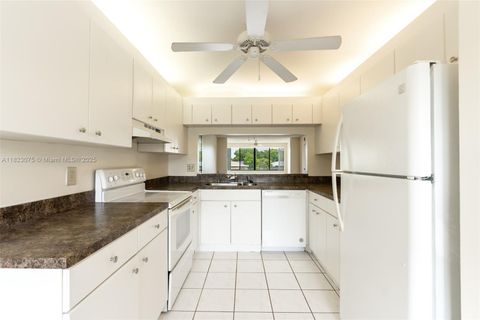 Photo of 9455 N Belfort Cir #211, Tamarac, FL 33321 (MLS # A11823075)