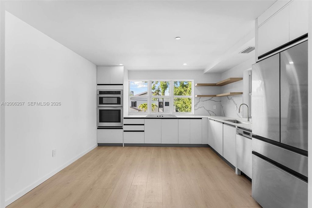 Photo of 824 SE 12th Ct #828, Fort Lauderdale, FL 33316 (MLS # A12006207)