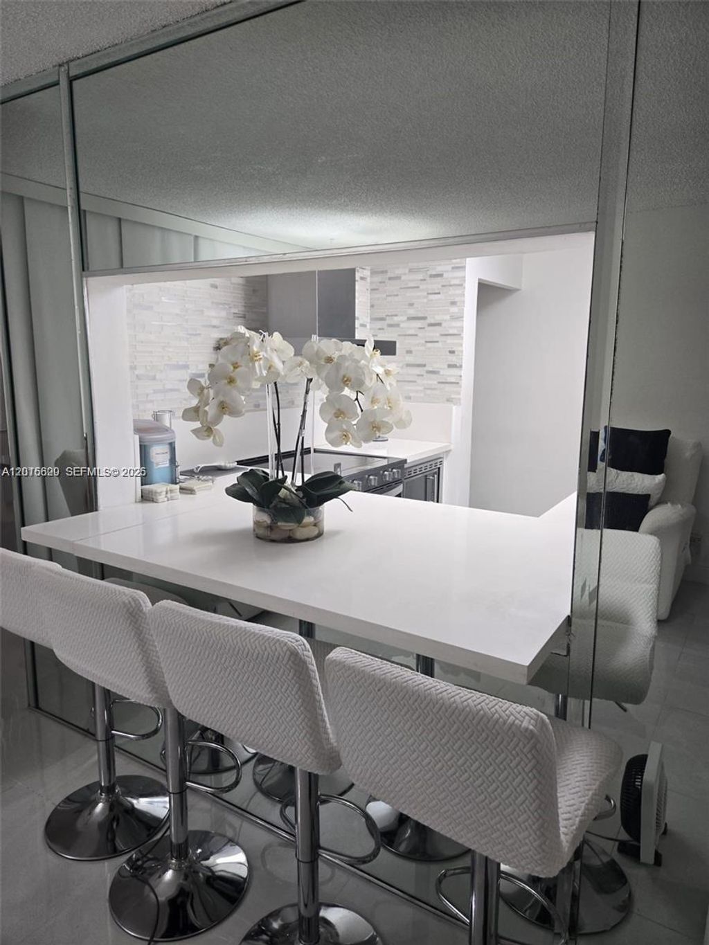 Photo of 9410 Live Oak Pl #103, Davie, FL 33324 (MLS # A12016620)