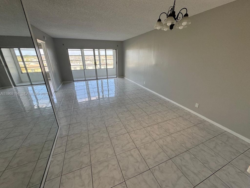 Photo of 1101 Crystal Lake Dr #508, Deerfield Beach, FL 33064 (MLS # A11968194)