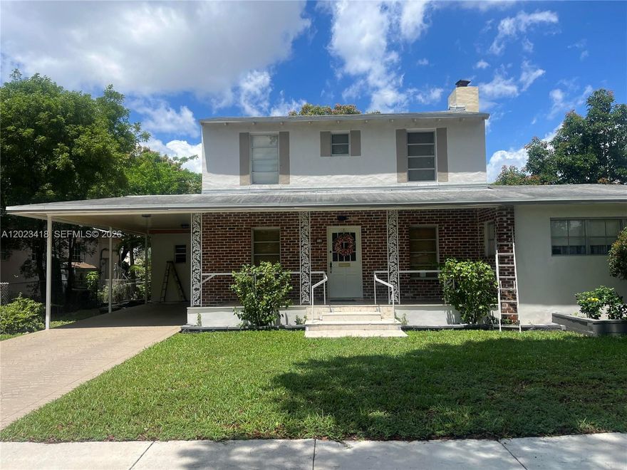 LARGE LOT less than  a block from 'the circle'.  Unique original 2 story with a 'wrap around addition.  EXTRA Structures / ROOMS:  extended covered parking, concrete room pending conversion to 3rd Bathroom (sewer pipe close) with Laundry,  TWO CAR GARAGE with alley access pending conversion to GUEST HOUSE, mostly remolded with working fireplace, LARGE  master bedroom Also with backyard access (potential Rental).   Tile 24x48 matt and LIGHT natural oak floors, seamless Quartz counters,  fluted porcelain farm sink, Bespoke STOVE and Glass front Refrigerator.  Pocket farmhouse doors, Working fireplace.  Landscape with large Butterfly & Bea Trees, Mango too.