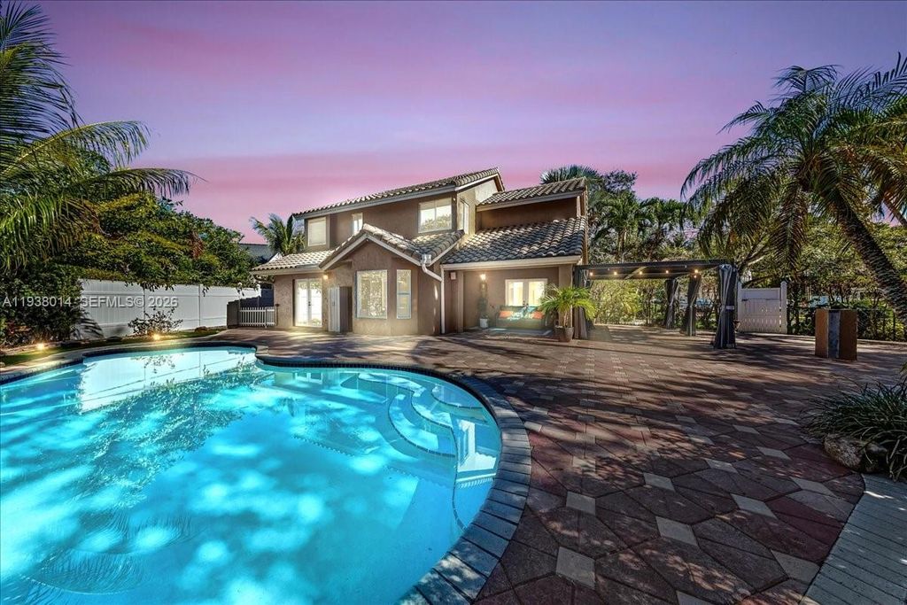 Photo of 6401 NW 57th Ln, Parkland, FL 33067 (MLS # A11938014)