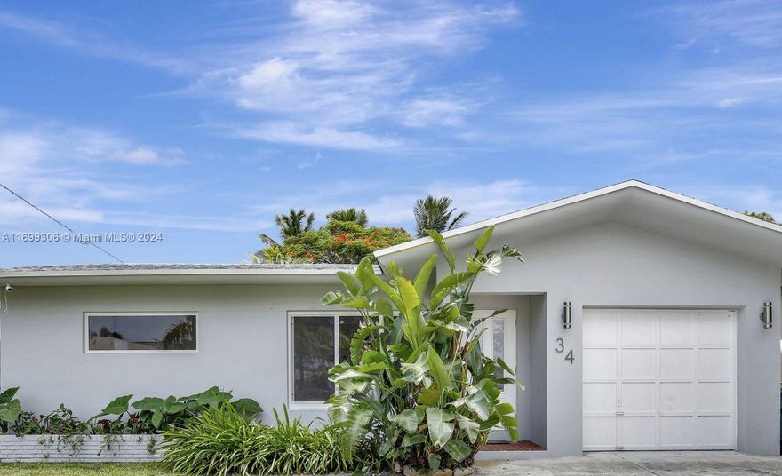 Welcome to your private retreat in the heart of the desired Dania Beach. Charming and tastefully remodeled 2BD / 1BA single family home featuring an amazing new patio, new roof, new impact windows, stunning new bathroom and updated kitchen with stainless steel appliances – all done in 2024. Spacious garage with washer and a new dryer. The entire house is freshly painted inside and out. Security cameras ready to be connected. The enormous back yard offers plenty of room for a pool, meditation, gardening and relaxation. This investor’s friendly property is located East of US1 just 10 minutes from the beach, Ft Lauderdale Airport, Dania Pointe and within walking distance to shops, restaurants and entertaining. Look no further – this is your dream home.