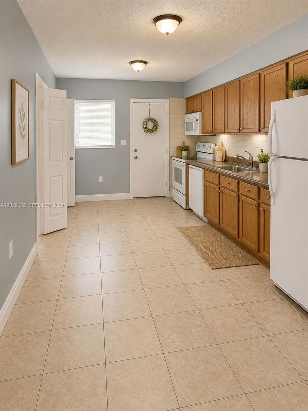 Photo of 701 SW 1st St #1, Dania Beach, FL 33004 (MLS # A12029182)