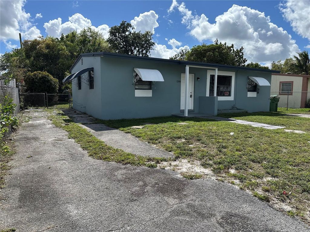 Photo of 1306 NW 11th Pl, Fort Lauderdale, FL 33311 (MLS # A11752267)