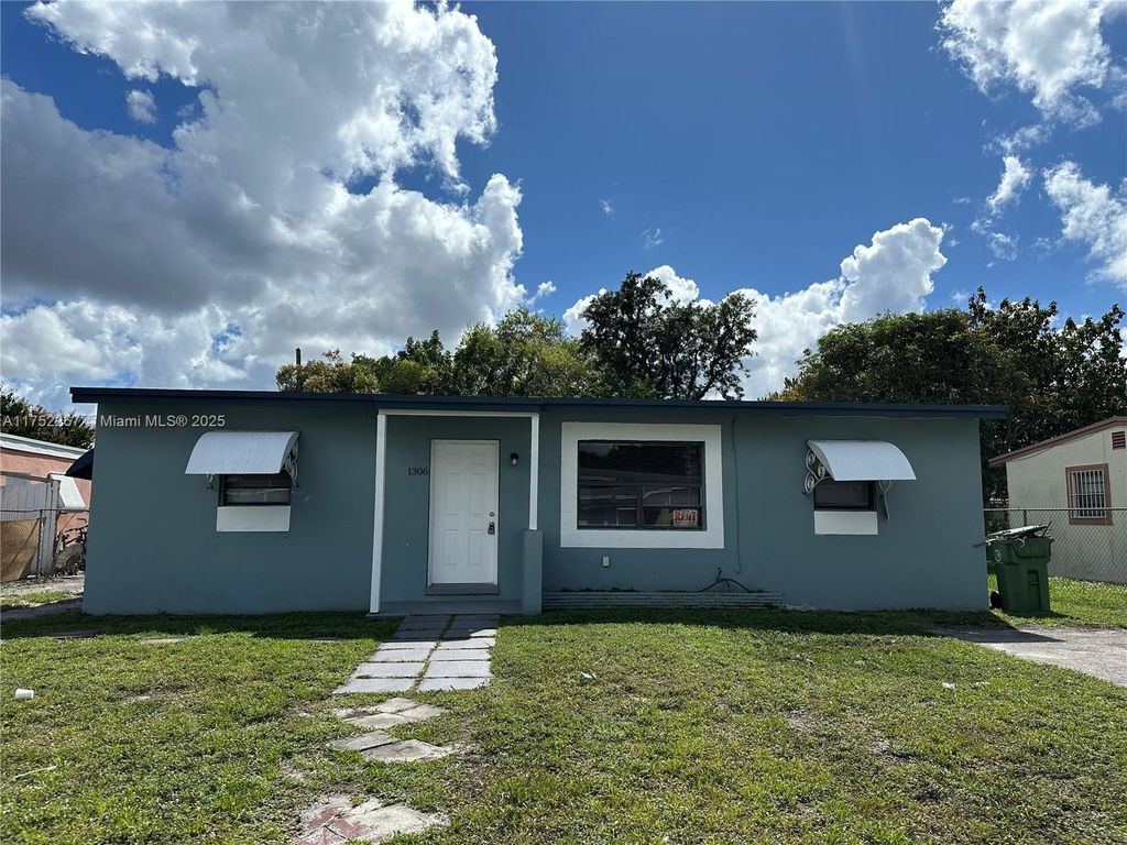 Photo of 1306 NW 11th Pl, Fort Lauderdale, FL 33311 (MLS # A11752267)