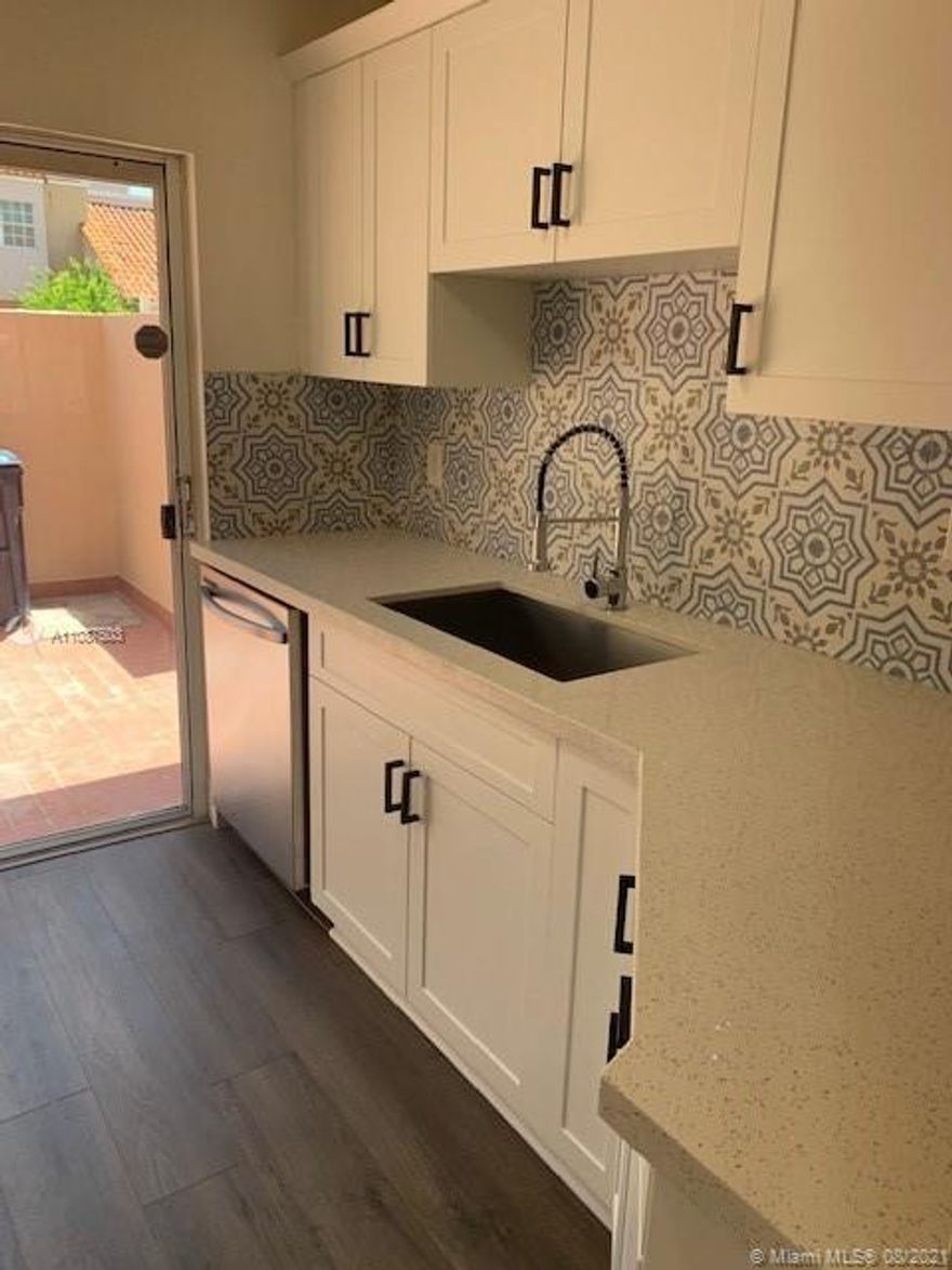 This townhouse is a 2 bed 2 and half bath unit was has been remodeled tastefully. It has a new roof that is only one year old. It has both bedrooms upstairs with its own bathrooms and each bedroom has an office. Downstairs has a half bath for guests. There are 2 parking spaces in front of home and also plenty of parking on the back side of house. This is the nicest unit for sale in sunset harbour.