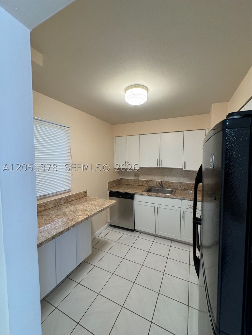 Photo of 6505 Winfield Blvd #B-2, Margate, FL 33063 (MLS # A12051378)