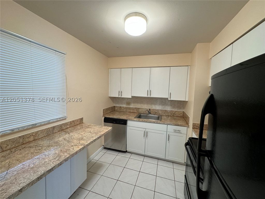 Photo of 6505 Winfield Blvd #B-2, Margate, FL 33063 (MLS # A12051378)