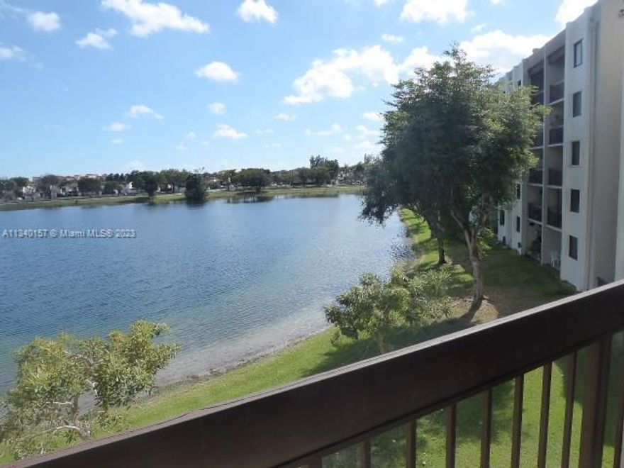 Direct Lake front view from your Balcony!  Spaicous unit on 3rd floor. Tile floors, crown moldings. Remodeled kitchen opens to Dining/Living Area. Central A/C from 2018.  Washer/Dryer inside unit. Assigned parking plus plenty of guest spaces.  Enjoy pool, tennis courts, patrolled security.
Conveniently located with easy access to dolphin Mall, FLorida's turnpike, airport and  Doral.