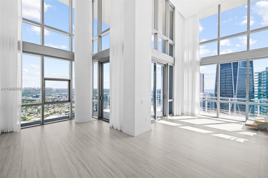 Located in Miami Worldcenter, the second-largest master-planned community in the U.S. 
PARAMOUNT Miami Worldcenter is renowned for offering one of the most comprehensive amenity collections anywhere.
Available now, this unfurnished 4-bedroom + den, 5-bath duplex residence is a true must-see.
Enjoy access to 46 resort-style amenities, including five pools, full-service spa, outdoor lounges, summer kitchen, game room, state-of-the-art fitness center, boxing studio, basketball court, racquetball, yoga studio, observatory, jam room and recording studio, and much more.
Perfectly positioned just steps from the Brightline station, and minutes from the Port of Miami, Kaseya Center, Miami International Airport, Wynwood, and Miami Beach.