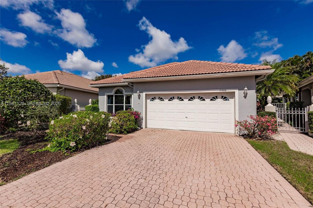 Photo of 17208 Hampton Blvd, Boca Raton, FL 33496 (MLS # A11981126)