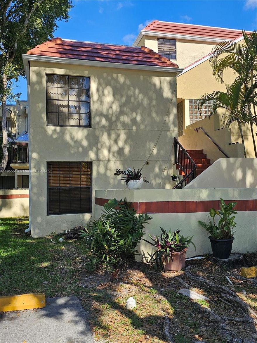 LARGE unit in famous Kendall Dr.  has a private entrance, located on 2nd floor. Beautifully tiled, upgraded kitchen with granite counter tops & white cabinetry PLUS stainless steel appliances & Full load washer/dryer. This super spacious and bright unit has 2 bedrooms and a Huge DEN, making it 3 operable bedrooms, plus an office/x-room. 2 spacious balconies..NEW roof, about a year old. & a great community to enjoy, membership fee includes all 3 calusa area clubs & pools. LOCATION is a PLUS on this condo,walking distance to 88 st ,surrounded by major stores & restaurants, bus station, FL turnpike and many more, This one is a winner for the right buyer with a VISION!!!!