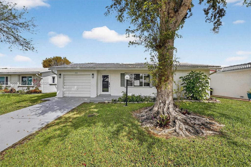 Photo of 8941 NW 13th St, Plantation, FL 33322 (MLS # A11979099)