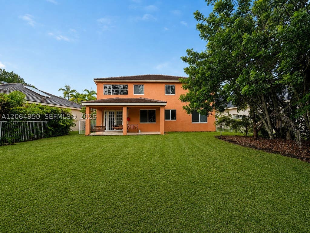 Photo of 1204 Chenille Cir, Weston, FL 33327 (MLS # A12064950)