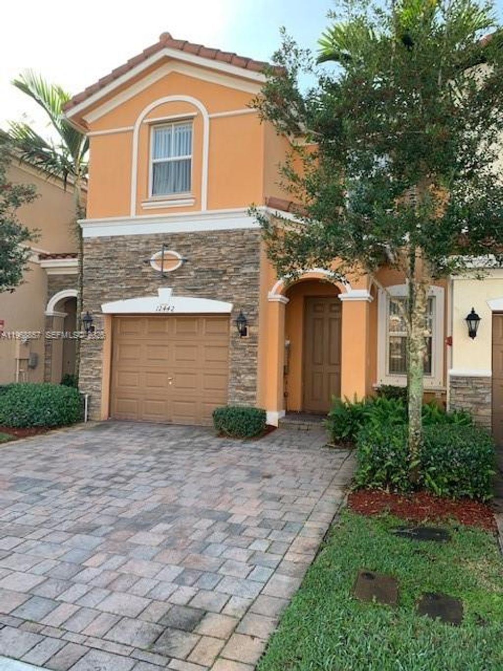 Photo of 12442 Emerald Creek Mnr #12442, Plantation, FL 33325 (MLS # A11968857)